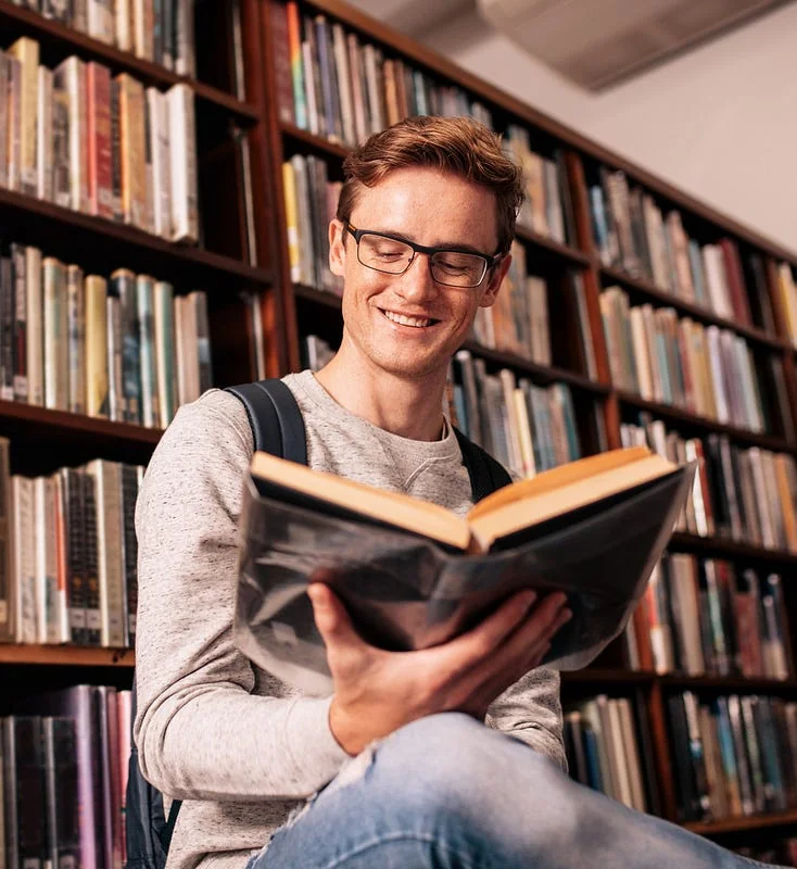 An author reading in a library